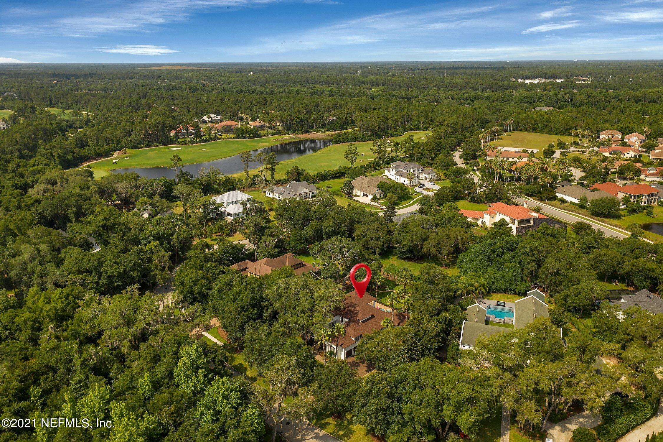 142 Marshall Creek Drive St. Augustine, FL 32095 - Photo 111 of 176 an aerial view of residential houses with outdoor space and trees