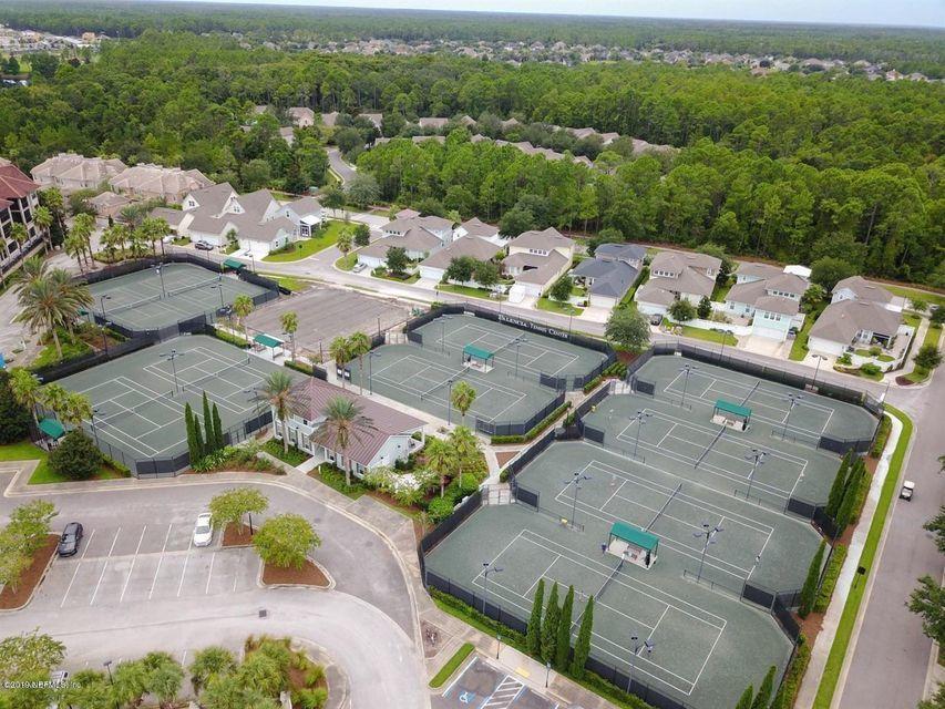 142 Marshall Creek Drive St. Augustine, FL 32095 - Photo 145 of 176 an aerial view of a city with lots of residential buildings