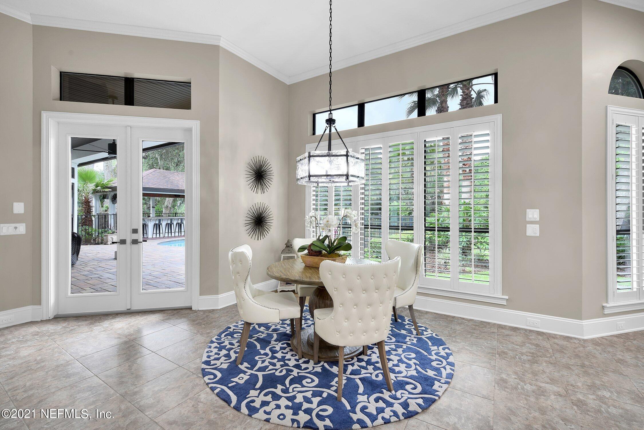 142 Marshall Creek Drive St. Augustine, FL 32095 - Photo 31 of 176 a living room with furniture and a large window