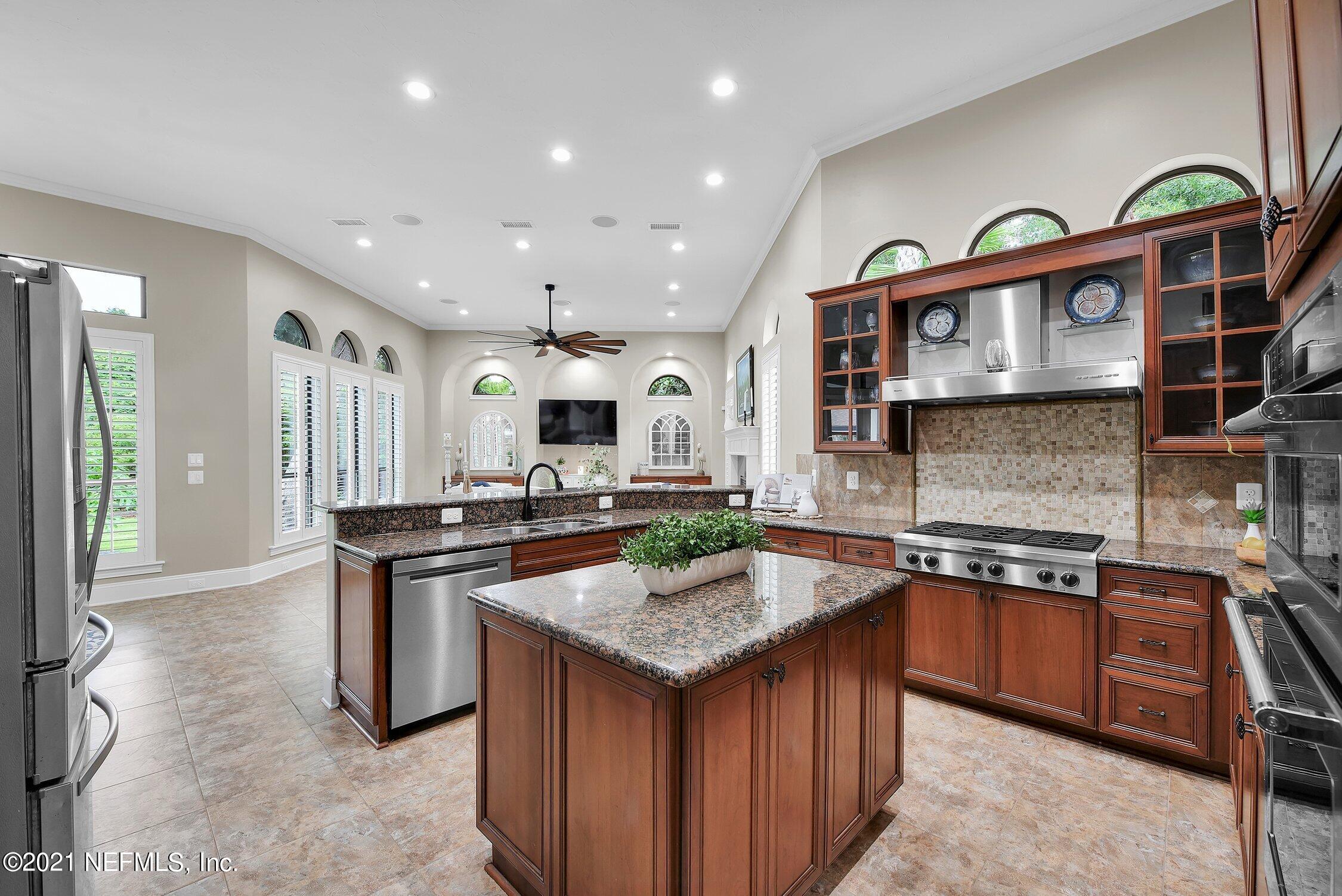 142 Marshall Creek Drive St. Augustine, FL 32095 - Photo 37 of 176 a kitchen that has a lot of cabinets in it