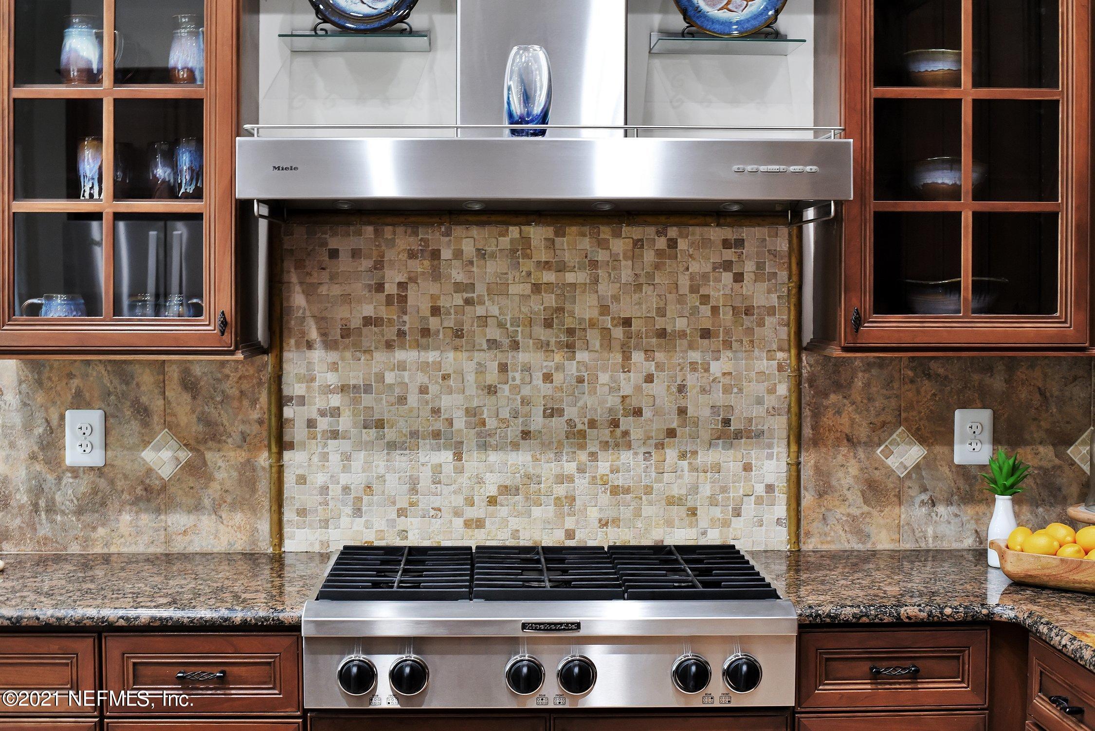 142 Marshall Creek Drive St. Augustine, FL 32095 - Photo 39 of 176 a close view of a stove