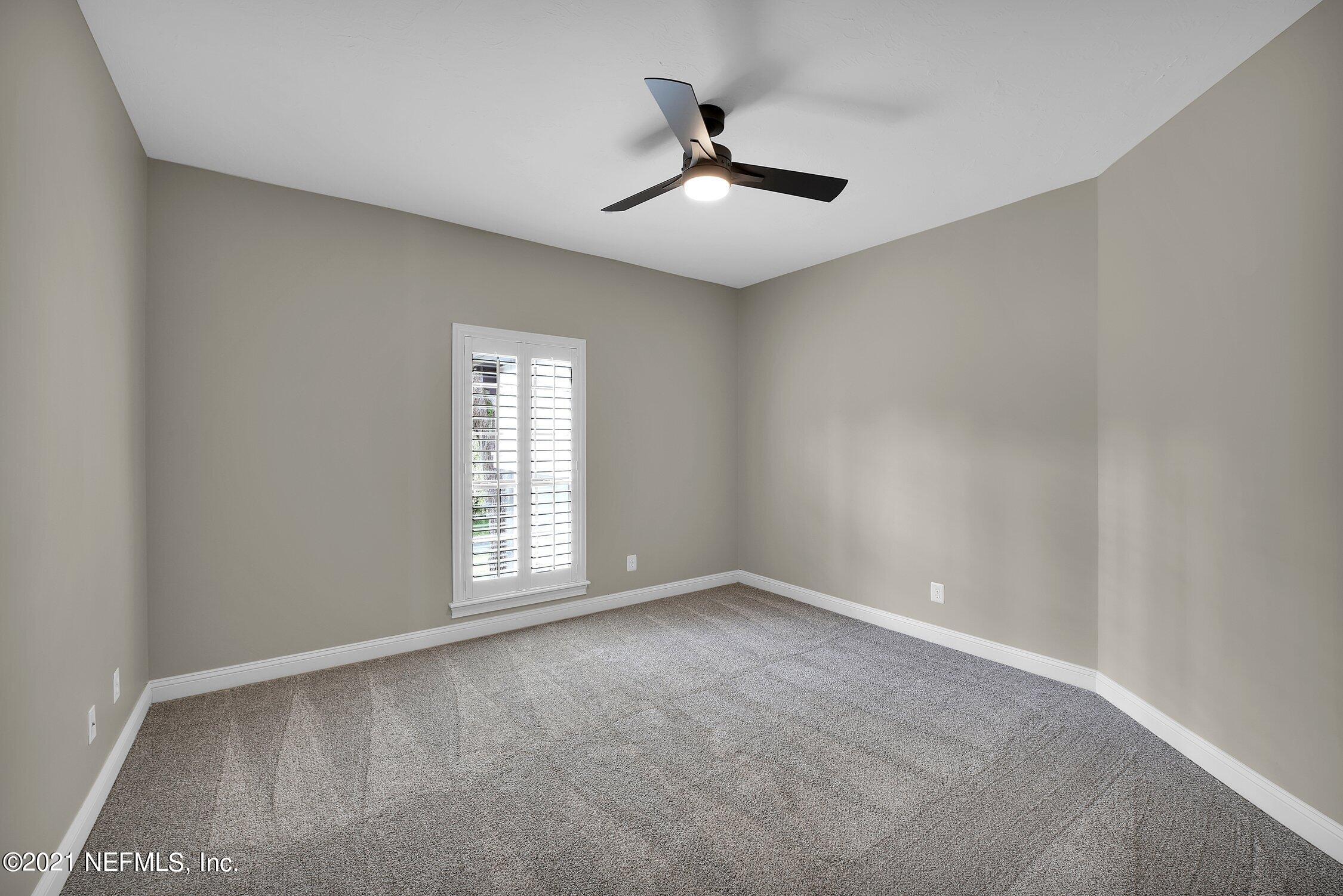 142 Marshall Creek Drive St. Augustine, FL 32095 - Photo 79 of 176 a view of an empty room with a window