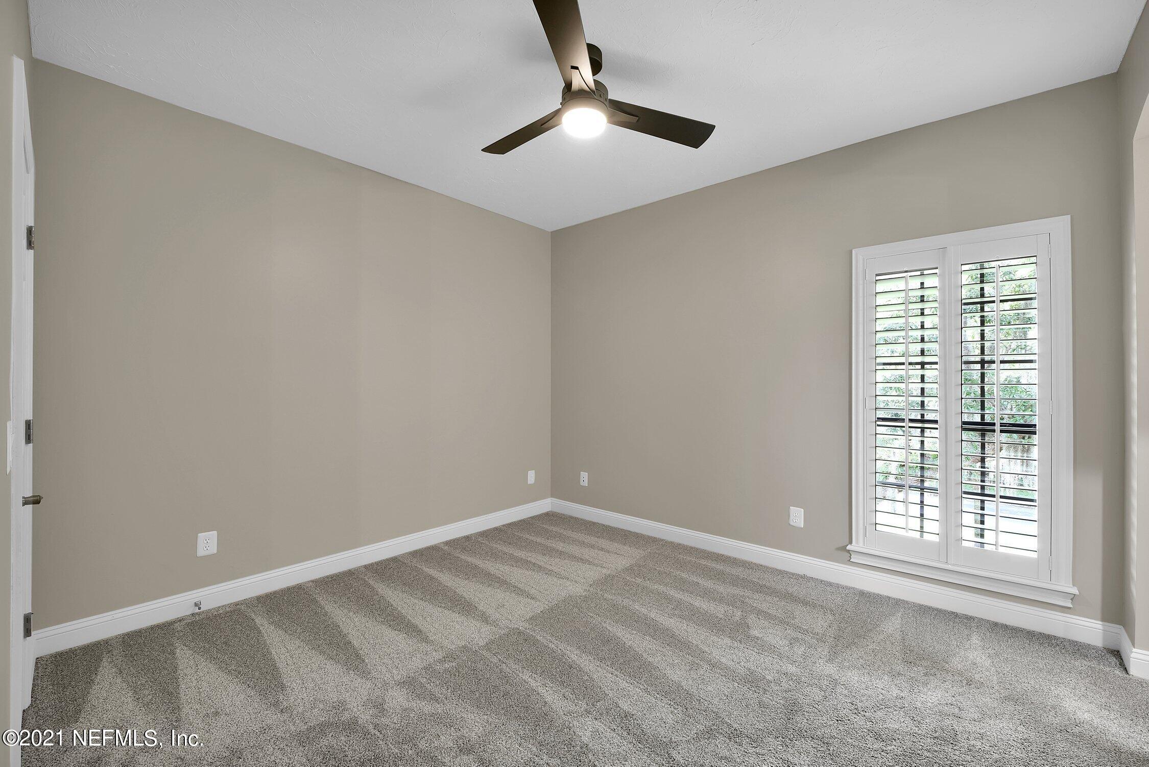 142 Marshall Creek Drive St. Augustine, FL 32095 - Photo 81 of 176 a view of an empty room with a window