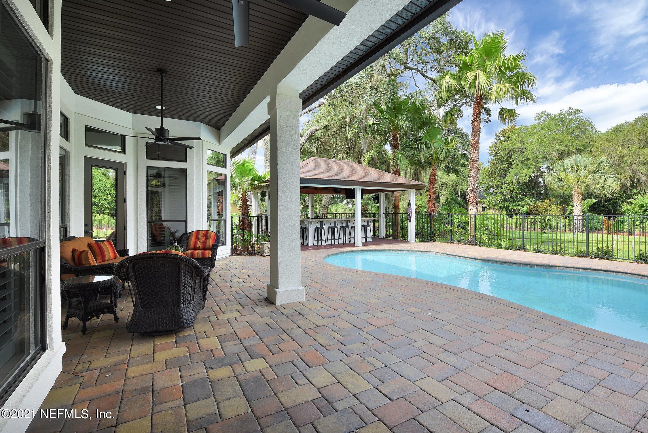 142 Marshall Creek Drive St. Augustine, FL 32095 - Photo 89 of 176 a living room with furniture and a large window