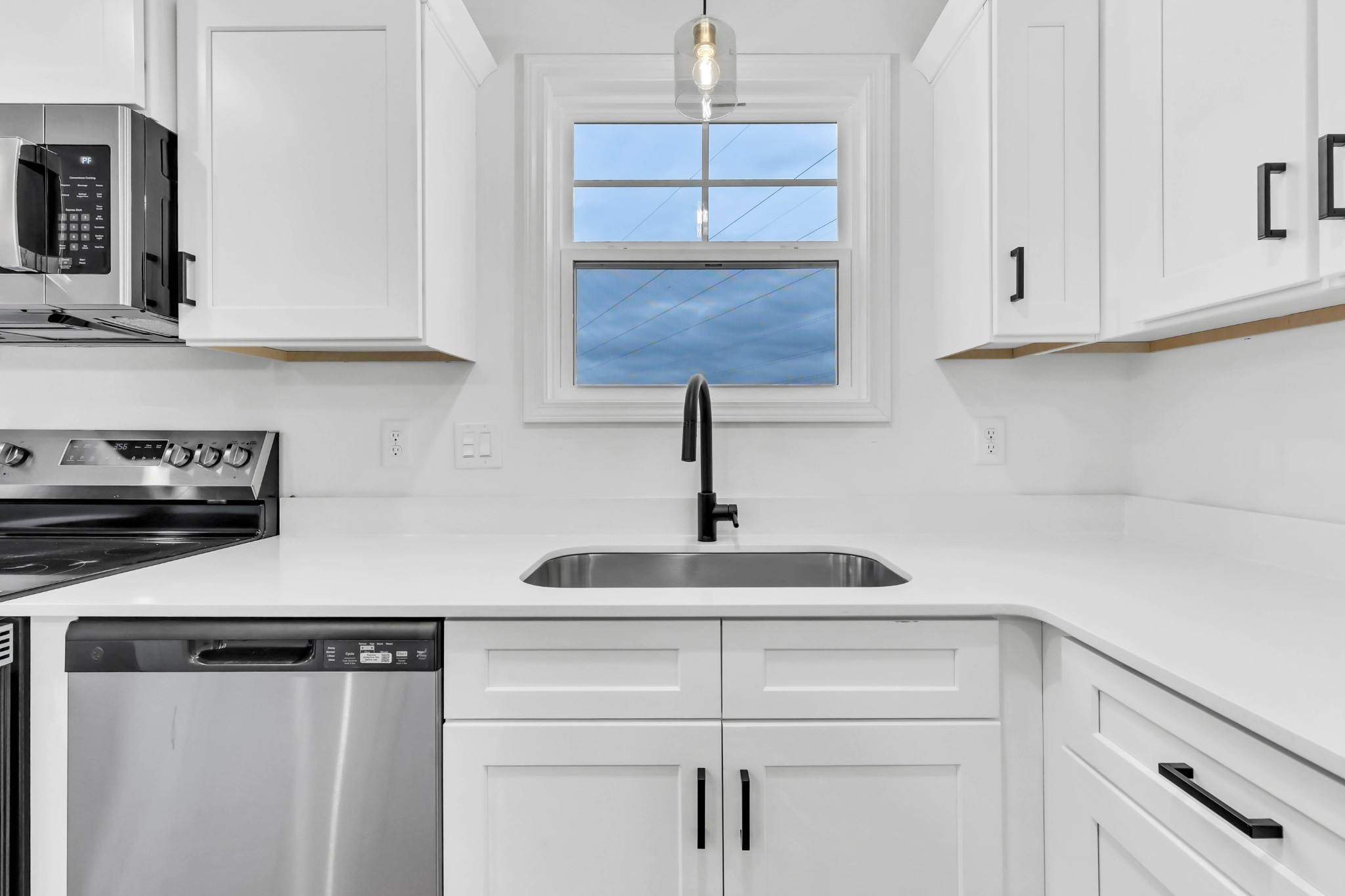 187 Quarry View Clarksville, TN 37043 - Photo 12 of 36 a kitchen with white cabinets and white appliances