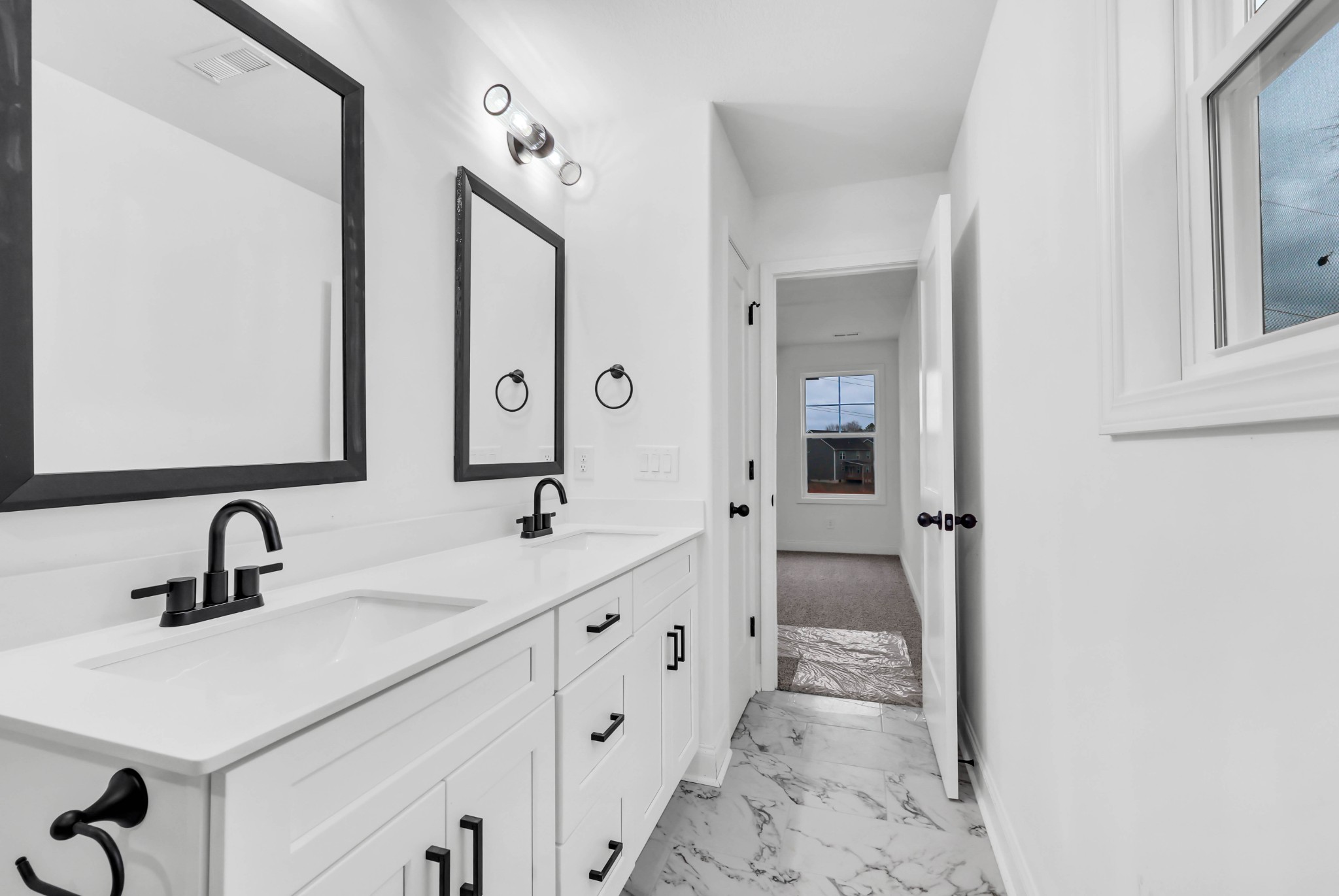 187 Quarry View Clarksville, TN 37043 - Photo 19 of 36 a bathroom with a double vanity sink mirror and