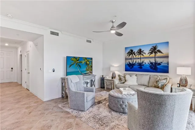 a living room with furniture and a couch