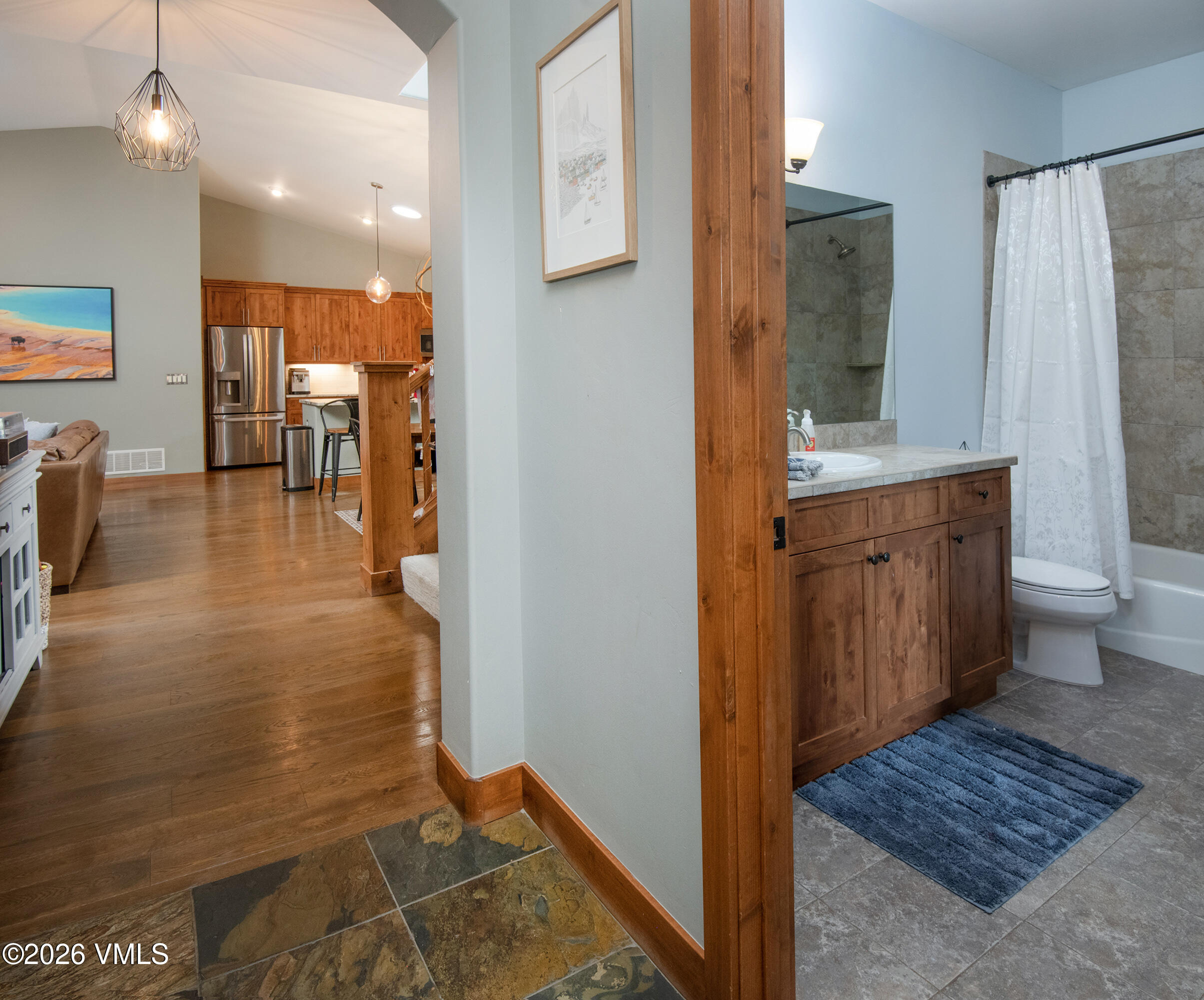 135 Palmer Loop Eagle, CO 81631 - Photo 11 of 54 a bathroom with a sink a mirror and a shower