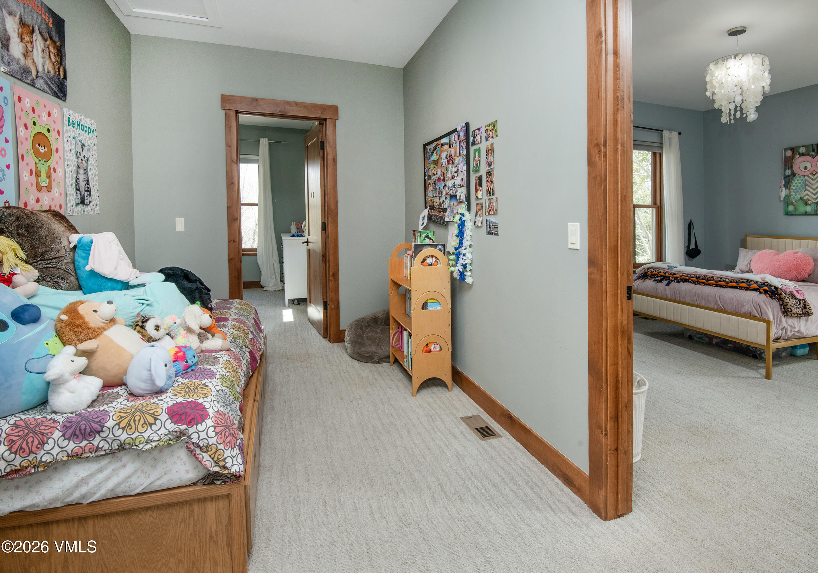 135 Palmer Loop Eagle, CO 81631 - Photo 27 of 54 a bedroom with bed and ceiling fan