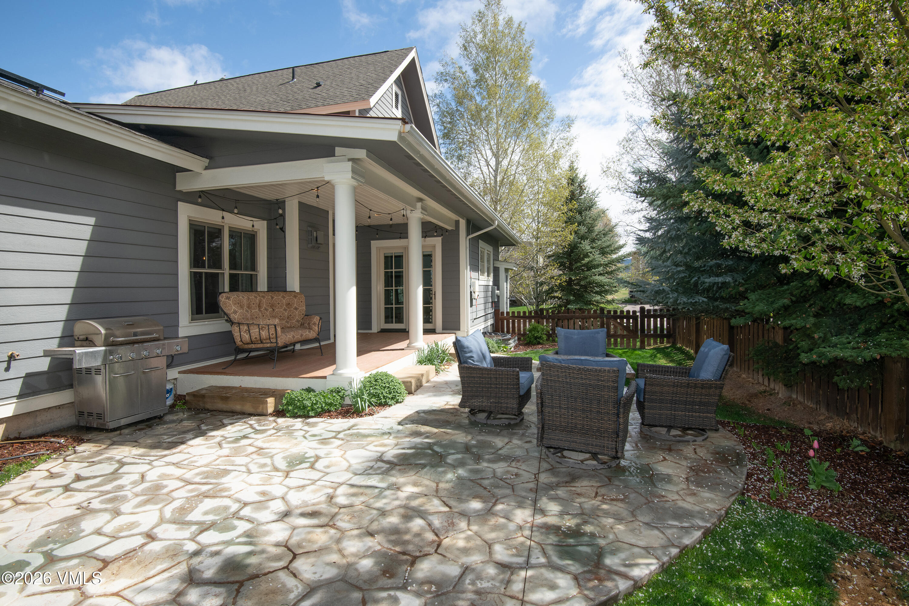 135 Palmer Loop Eagle, CO 81631 - Photo 3 of 54 a view of a patio with chair and tables