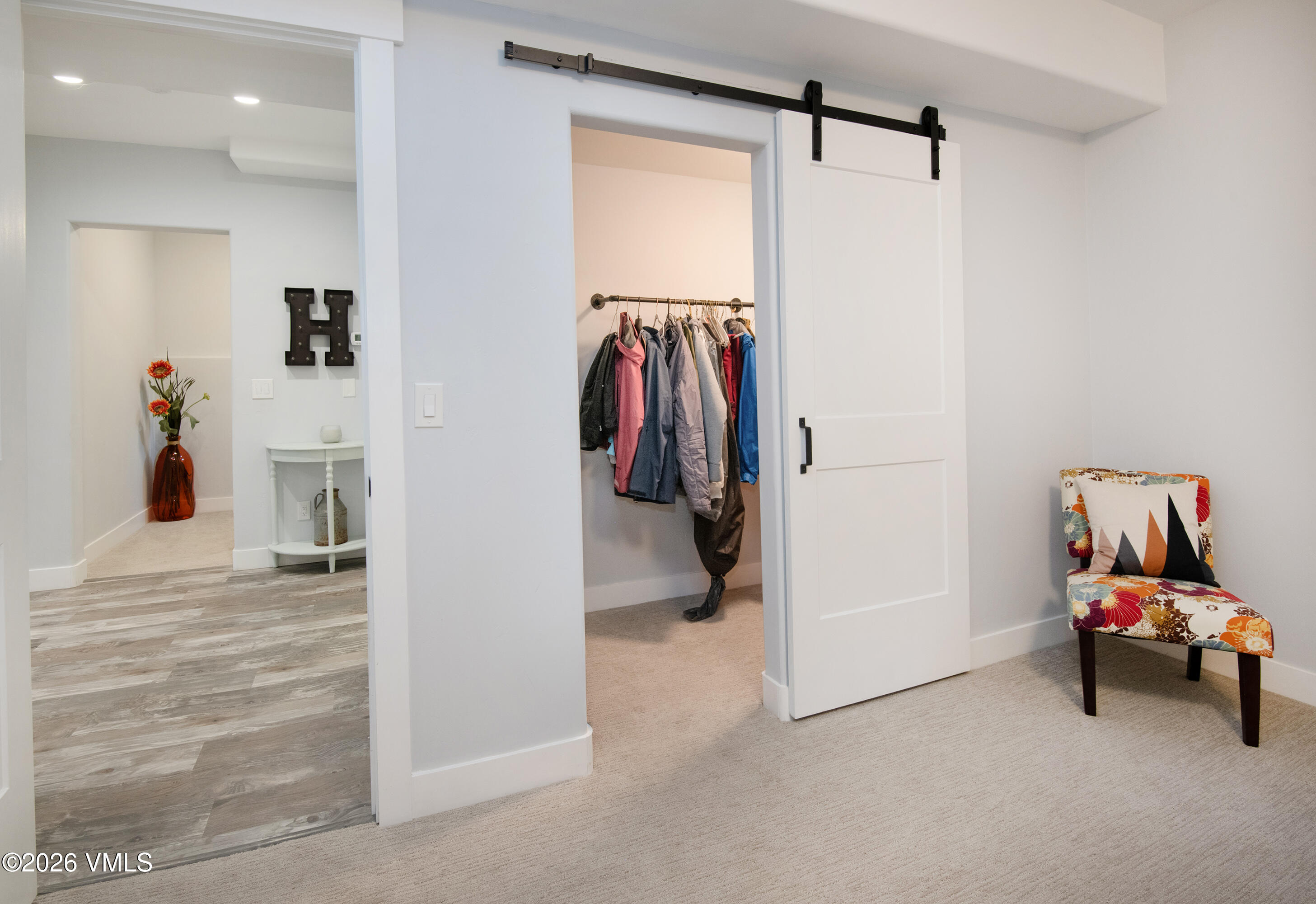 135 Palmer Loop Eagle, CO 81631 - Photo 39 of 54 a view of walk in closet with clothes and shoes