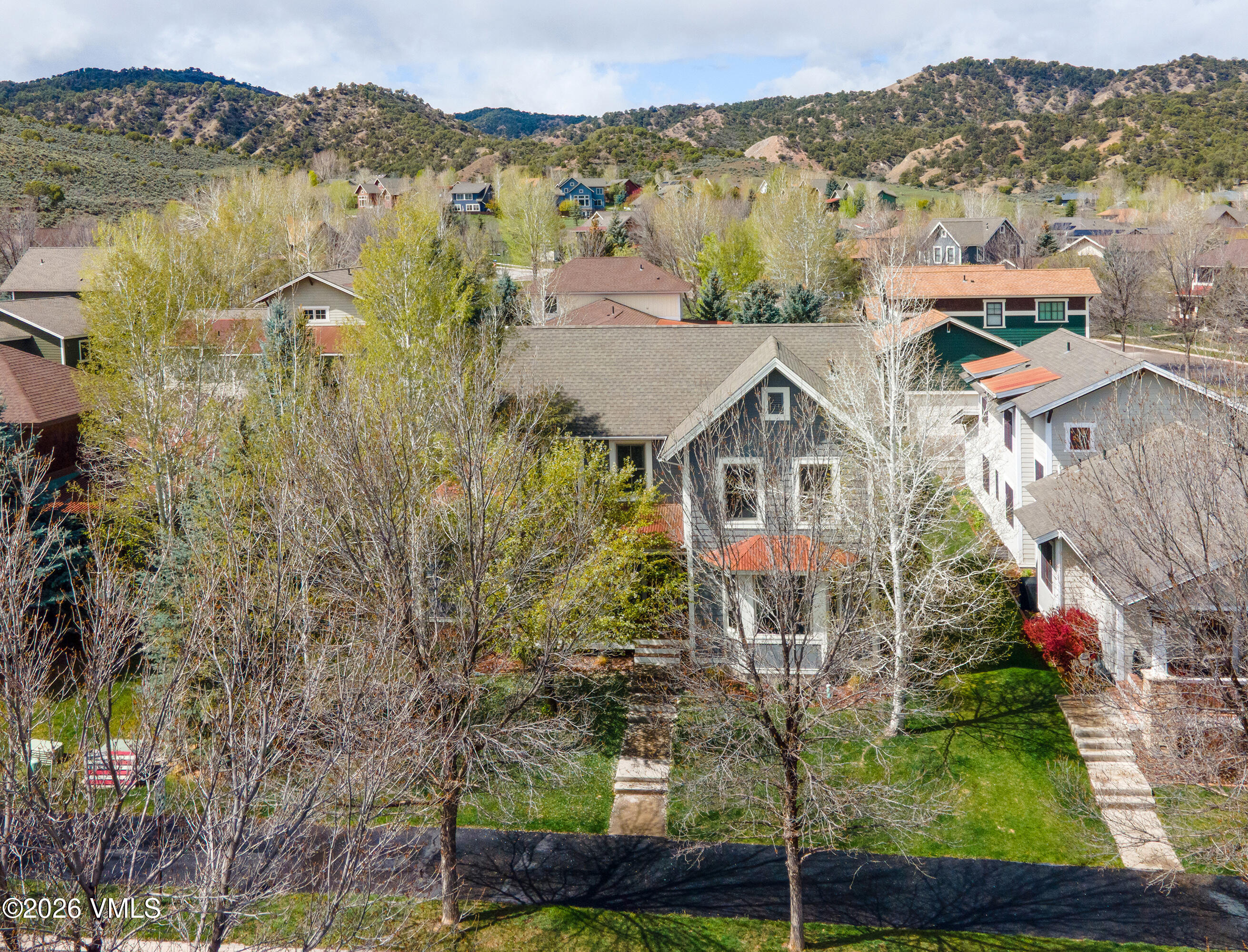 135 Palmer Loop Eagle, CO 81631 - Photo 46 of 54 a aerial view of a house with a lake view