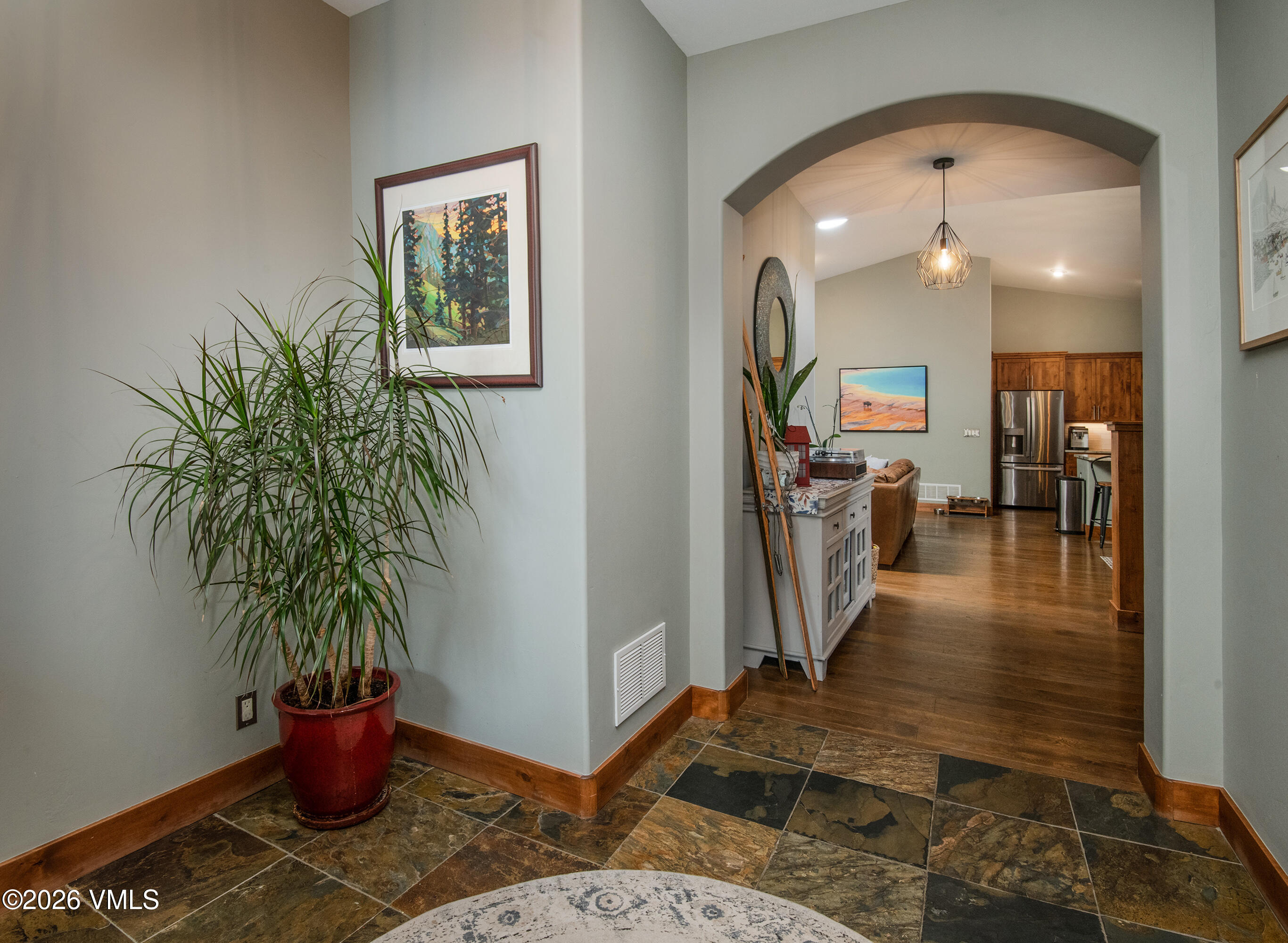 135 Palmer Loop Eagle, CO 81631 - Photo 5 of 54 a living room with furniture and a potted plant