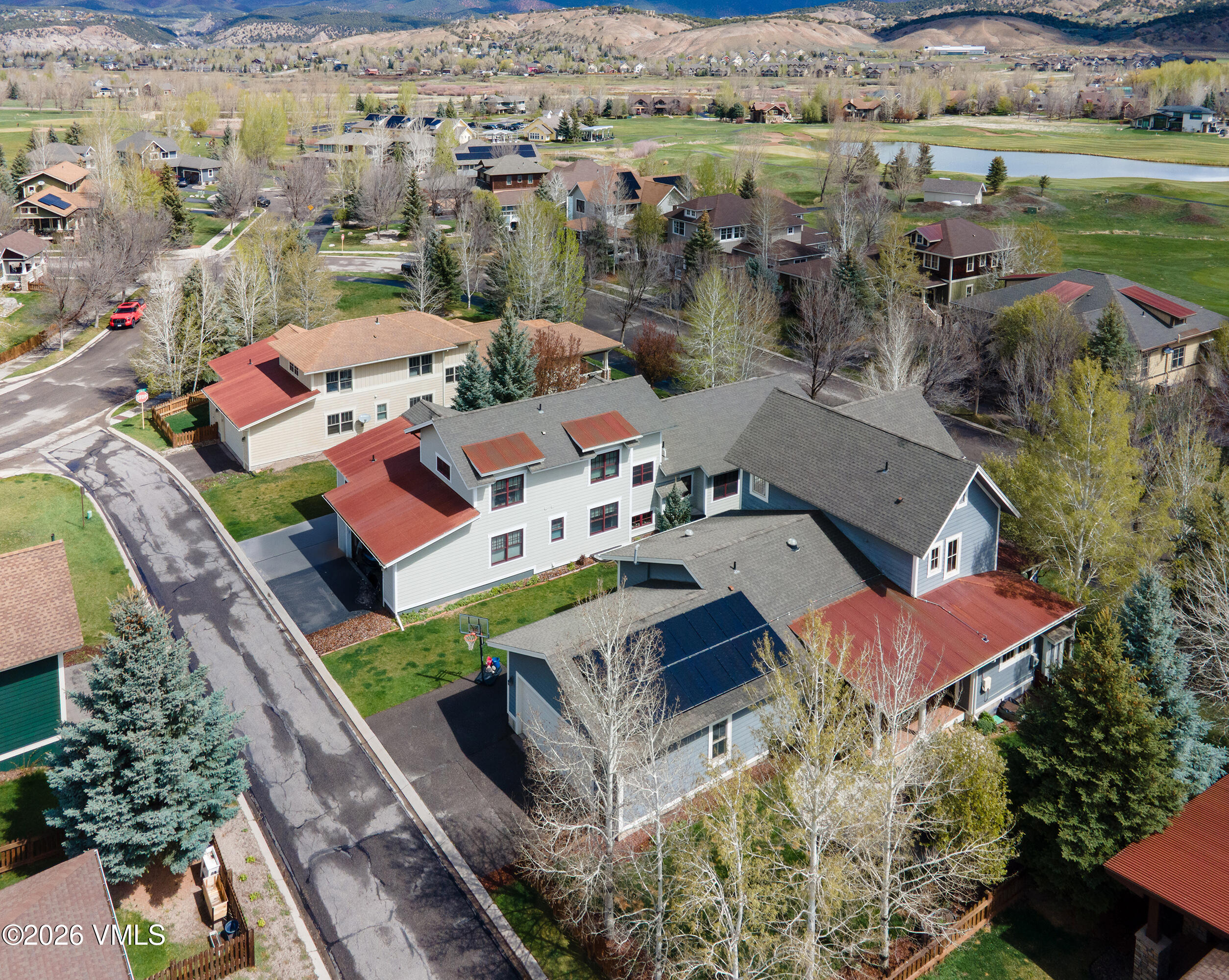 135 Palmer Loop Eagle, CO 81631 - Photo 51 of 54 an aerial view of residential houses with outdoor space and river