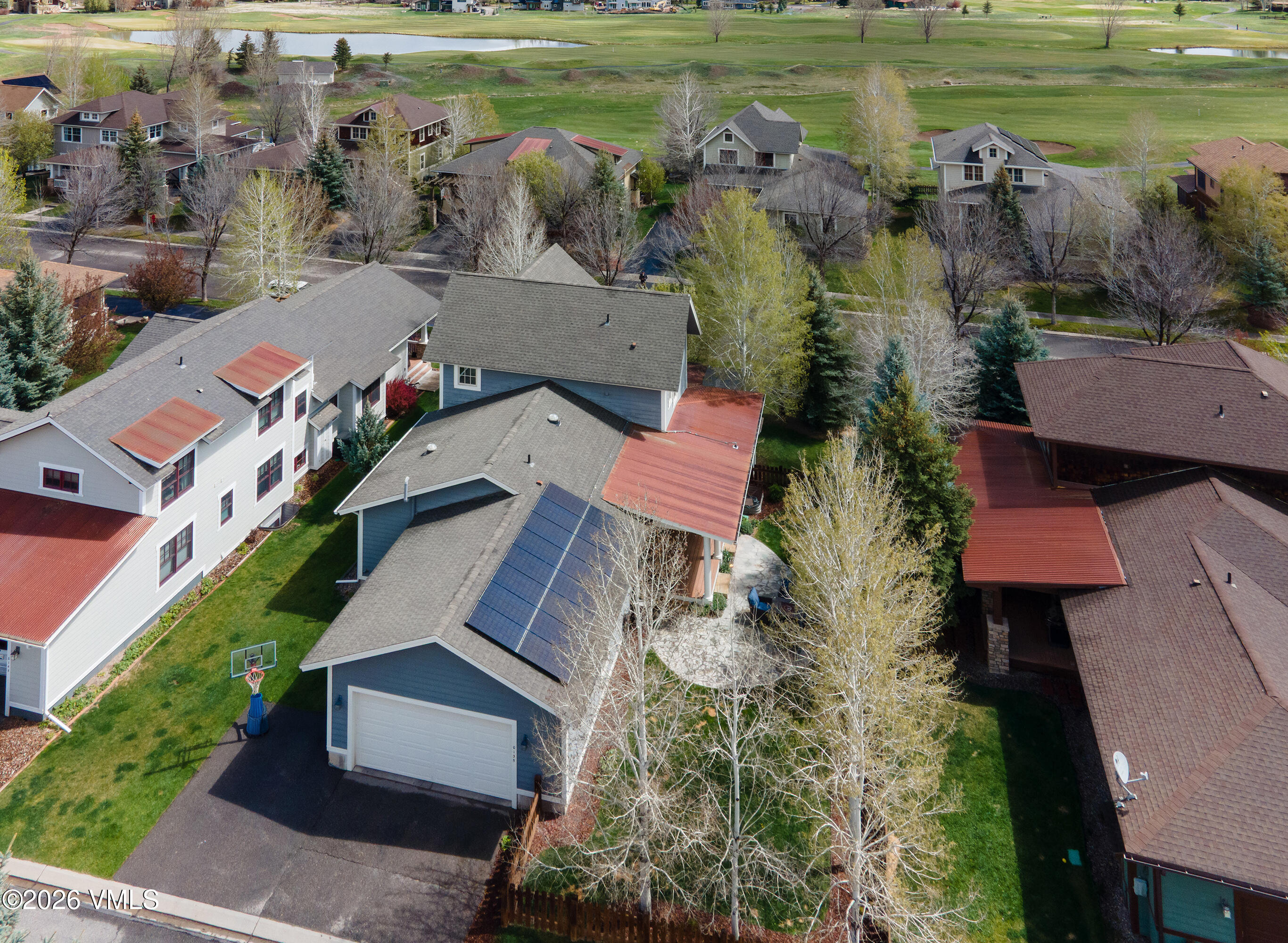 135 Palmer Loop Eagle, CO 81631 - Photo 52 of 54 an aerial view of a house with a lake view