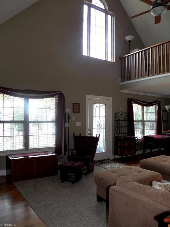 859 Riverview Rd Extension Lexington, NC 27292 - Photo 11 of 26 View from master bedroom door of living room. Lots of windows offer view of the lake and natural light to keep the place sunny and bright.