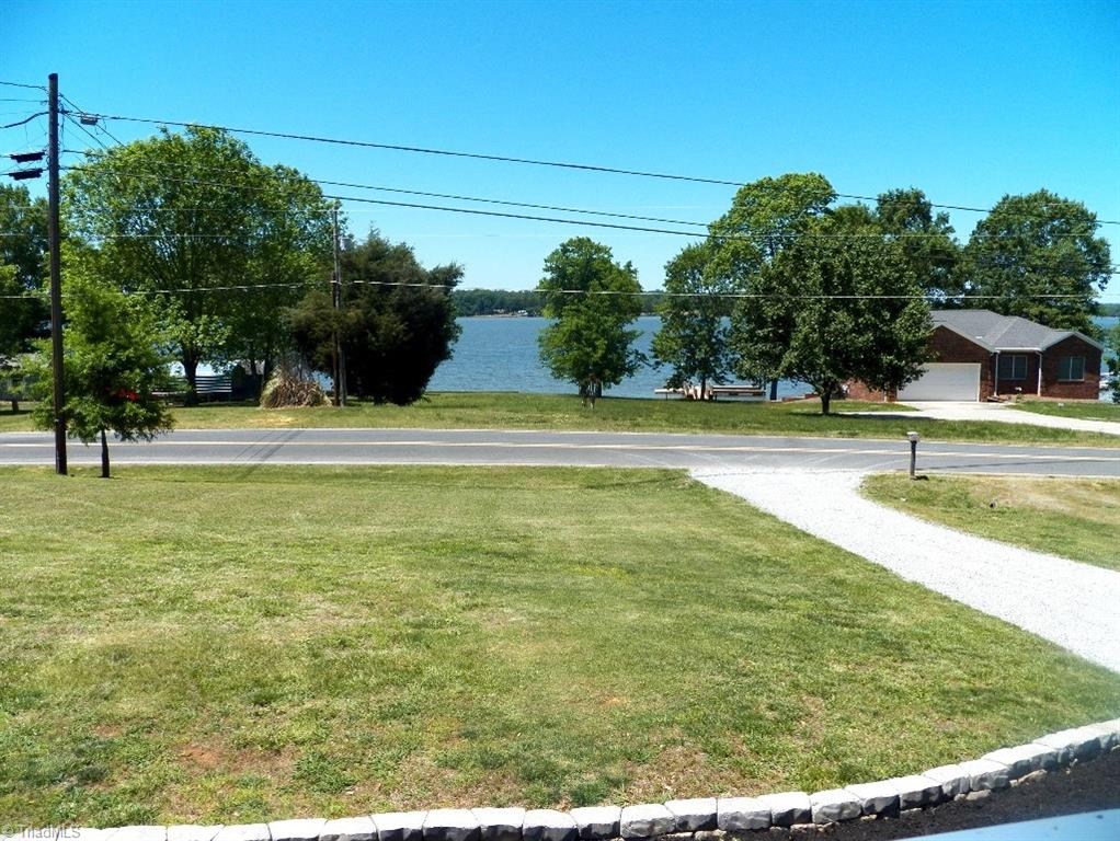 859 Riverview Rd Extension Lexington, NC 27292 - Photo 6 of 26 View from the porch of the lake across the road. Watch the boats go by and storms come in from the west and north sides of the lake.