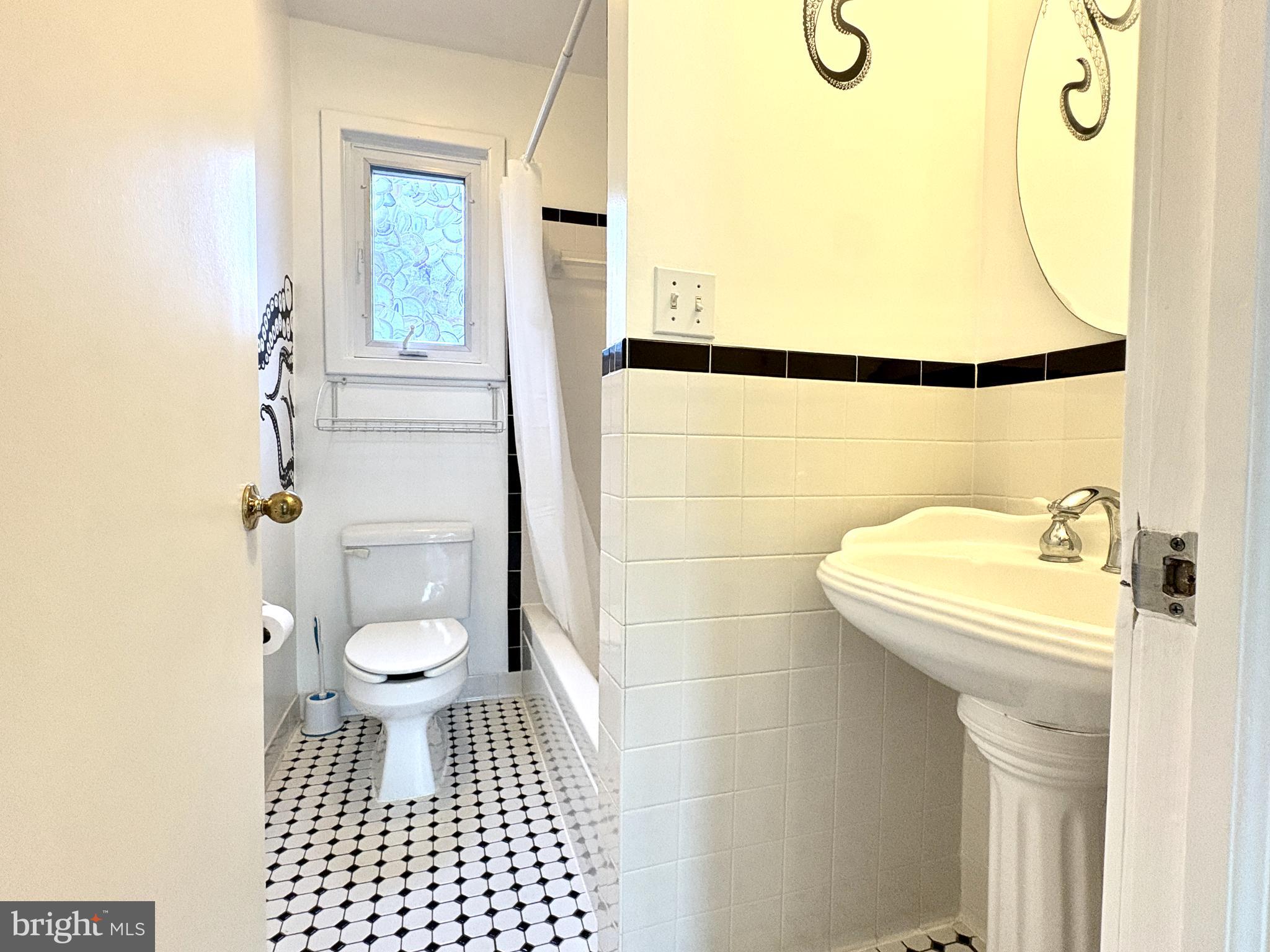 2513 Barrison Point Road Essex, MD 21221 - Photo 11 of 43 main level full bathroom