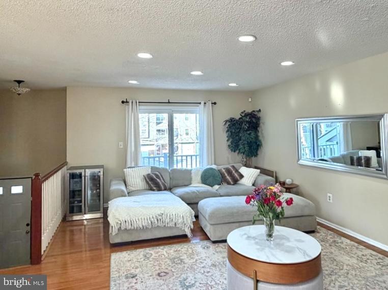 2 Halstead Place Princeton, NJ 08540 - Photo 5 of 16 a living room with furniture and a potted plant