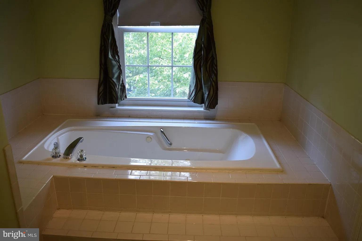 2 Halstead Place Princeton, NJ 08540 - Photo 10 of 16 a view of a bathtub in a bathroom