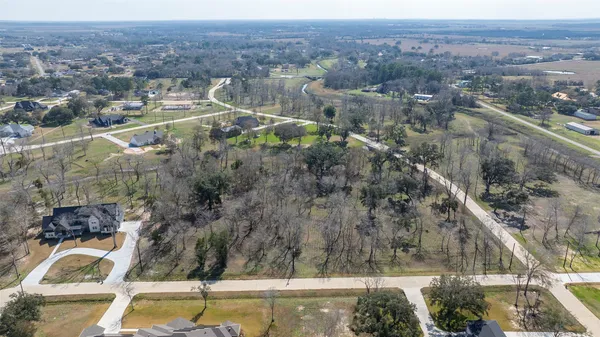 a view of lot of outdoor space and trees