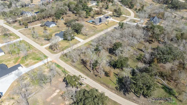 an aerial view of residential house with outdoor space