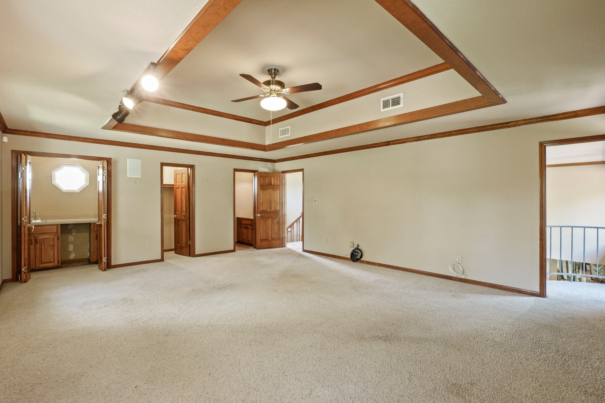 176 Logan Ranch Road Georgetown, TX 78628 - Photo 17 of 38 Game room looking at wet bar, walk-in closet, and half bath