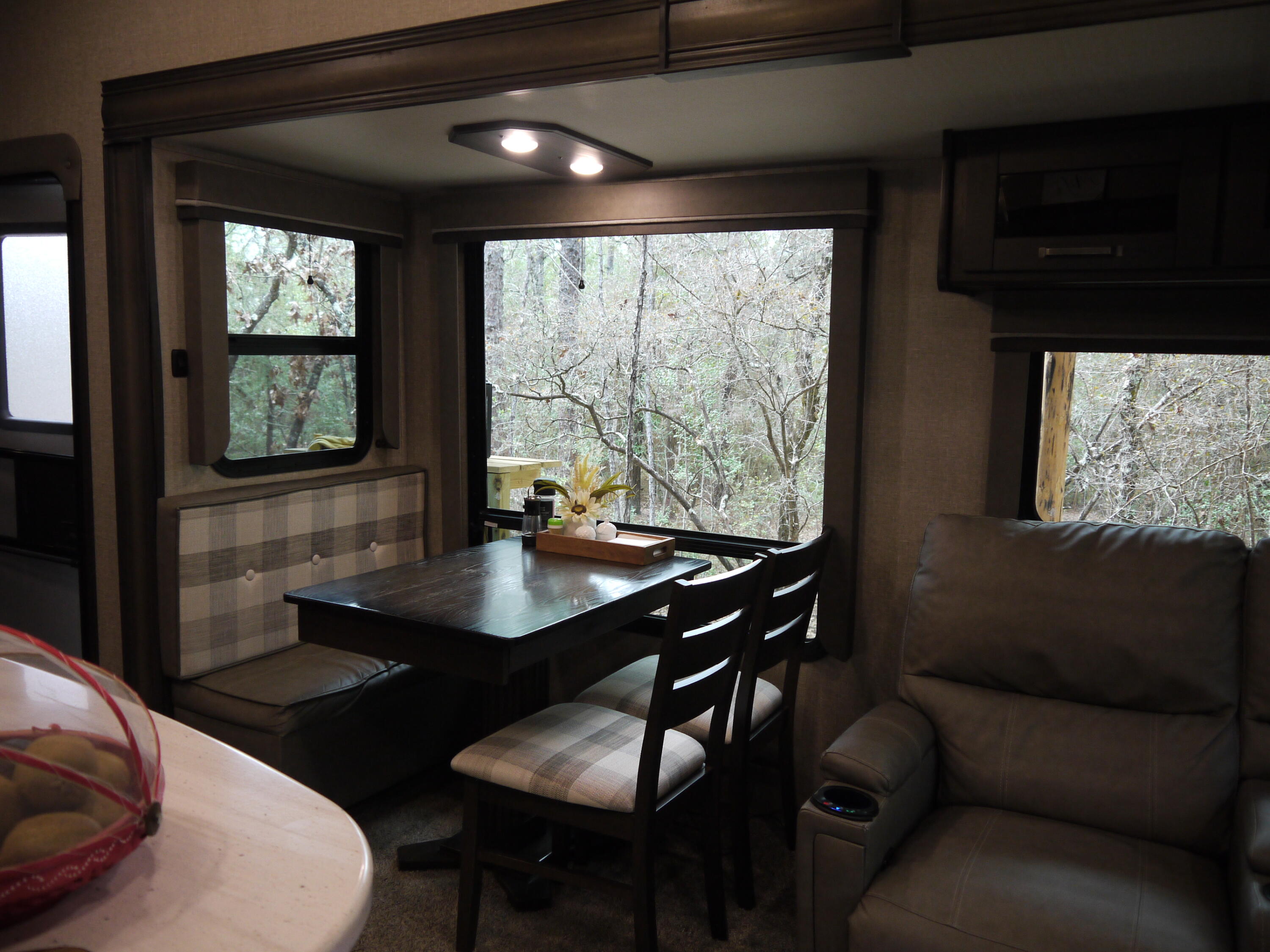 4449 Yellow Bluff Road Crestview, FL 32539 - Photo 28 of 42 a view of a dining room with furniture and window