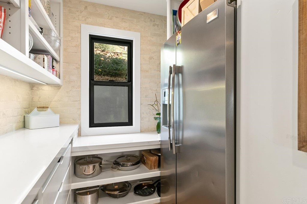 2924 Lone Jack Road Encinitas, CA 92024 - Photo 17 of 48 a bathroom with a sink and a mirror