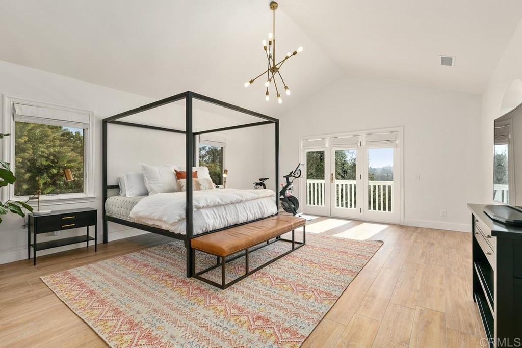 2924 Lone Jack Road Encinitas, CA 92024 - Photo 21 of 48 a bedroom with a bed and a window