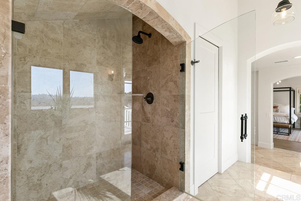 2924 Lone Jack Road Encinitas, CA 92024 - Photo 26 of 48 a bathroom with a shower and a sink