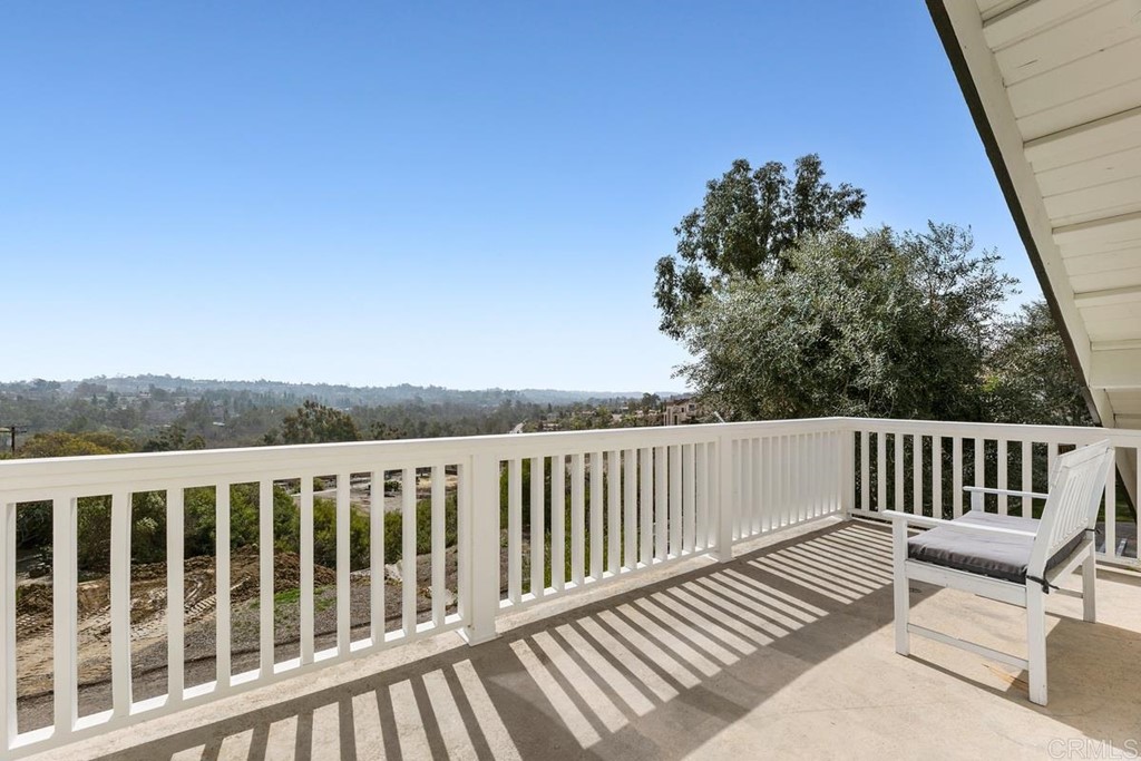 2924 Lone Jack Road Encinitas, CA 92024 - Photo 28 of 48 a view of a roof deck with wooden floor and fence