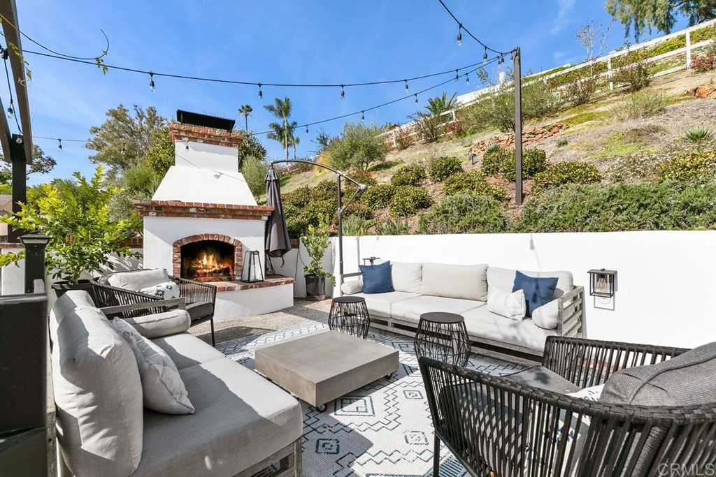 2924 Lone Jack Road Encinitas, CA 92024 - Photo 44 of 48 a view of a patio with couches table and chairs