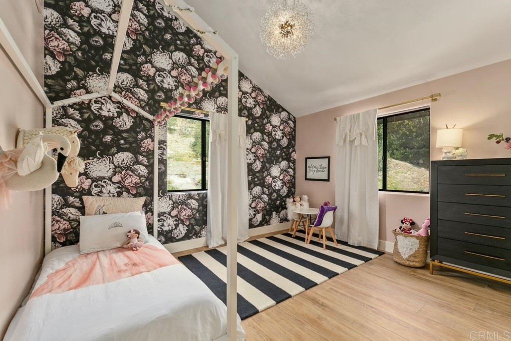 2924 Lone Jack Road Encinitas, CA 92024 - Photo 48 of 48 a bedroom with a bed and a window