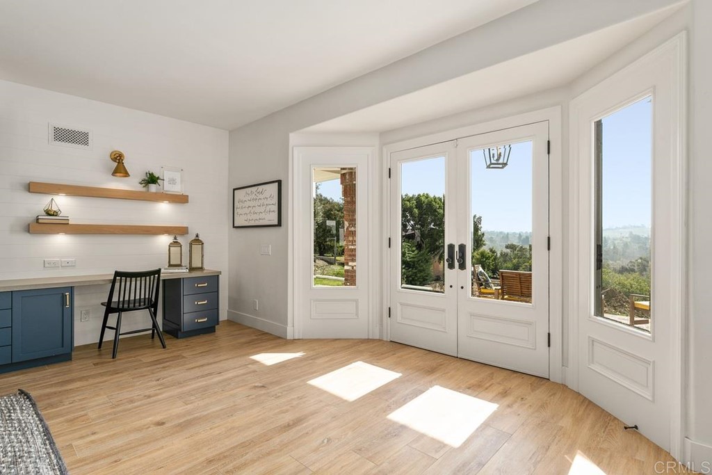 2924 Lone Jack Road Encinitas, CA 92024 - Photo 8 of 48 a view of a livingroom with furniture window and wooden floor
