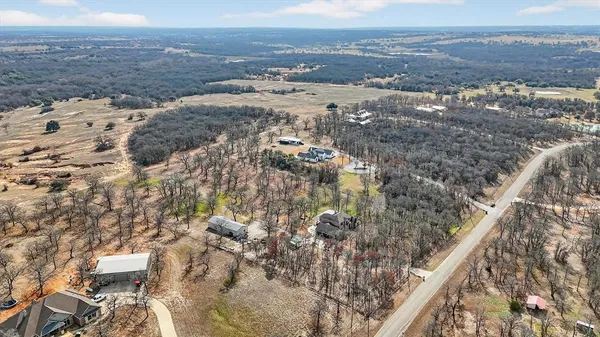 $949,000 | 125 River Rock Court, Poolville, TX 76487