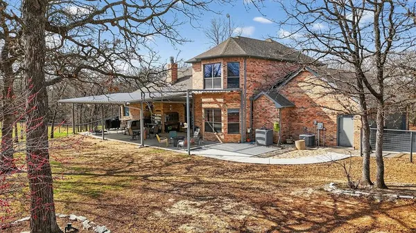 a building with trees in front of it