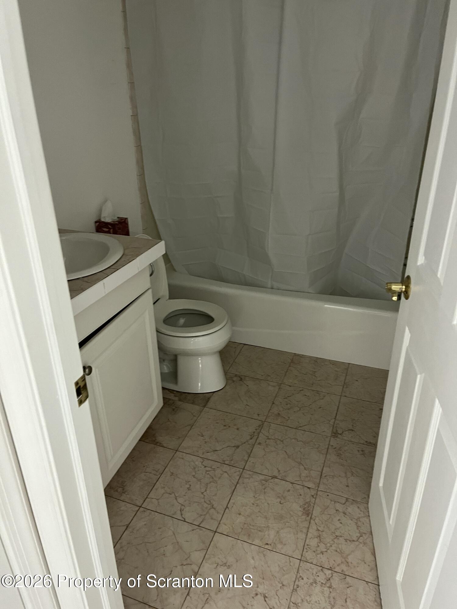 436 Ziegler Street Dupont, PA 18641 - Photo 11 of 17 a bathroom with a toilet and a shower