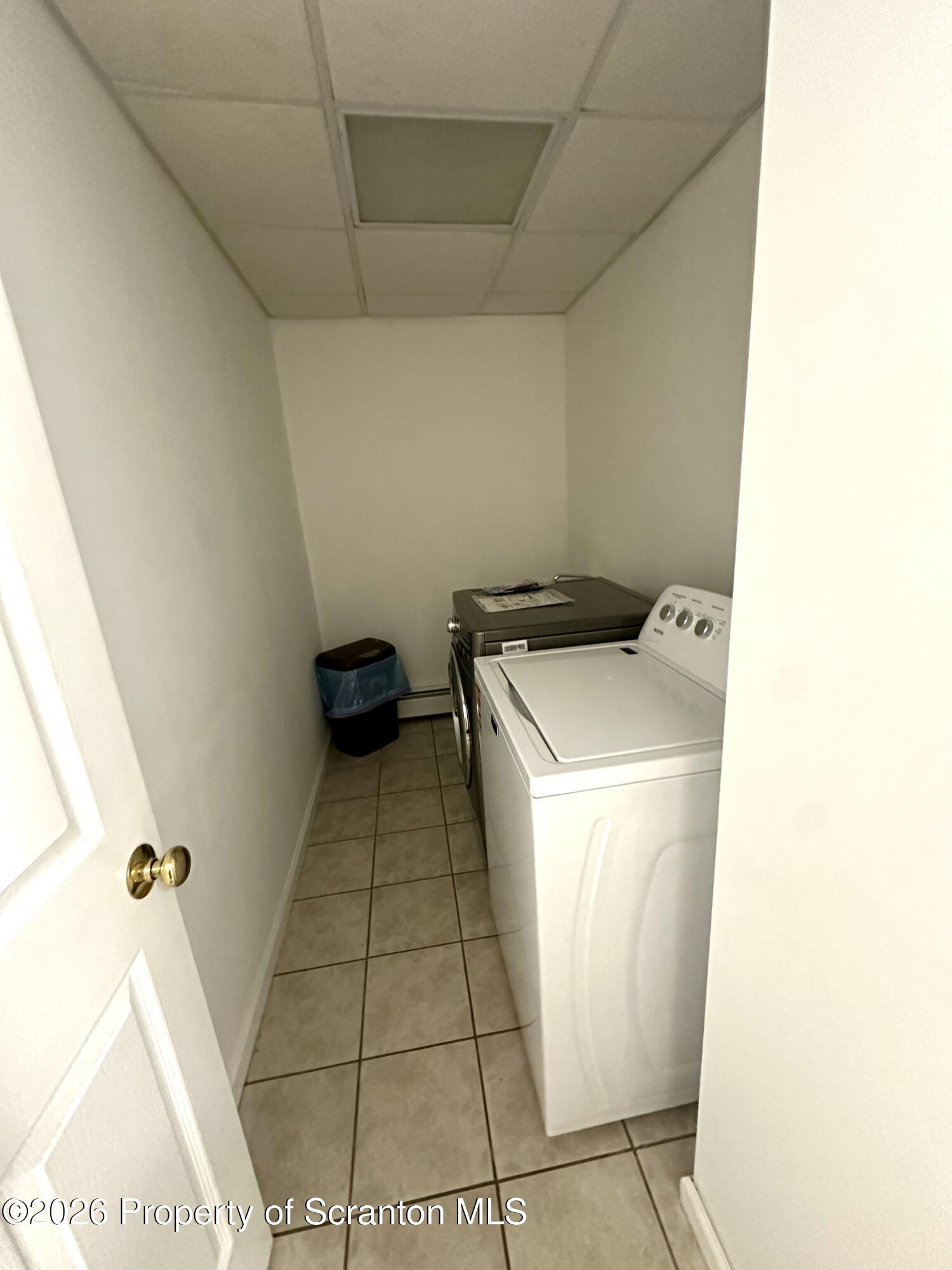 436 Ziegler Street Dupont, PA 18641 - Photo 15 of 17 a utility room with dryer and washer