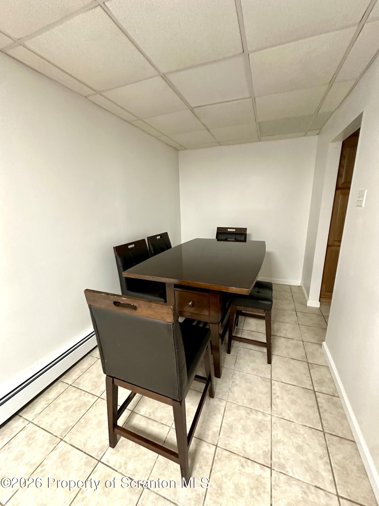 436 Ziegler Street Dupont, PA 18641 - Photo 6 of 17 a workspace with furniture and rug