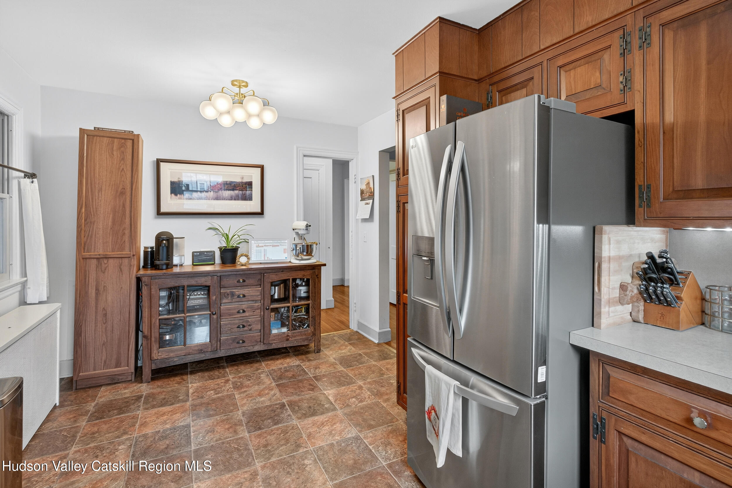 41 New Paltz Road Highland, NY 12528 - Photo 12 of 42 a kitchen with stainless steel appliances a refrigerator and a stove
