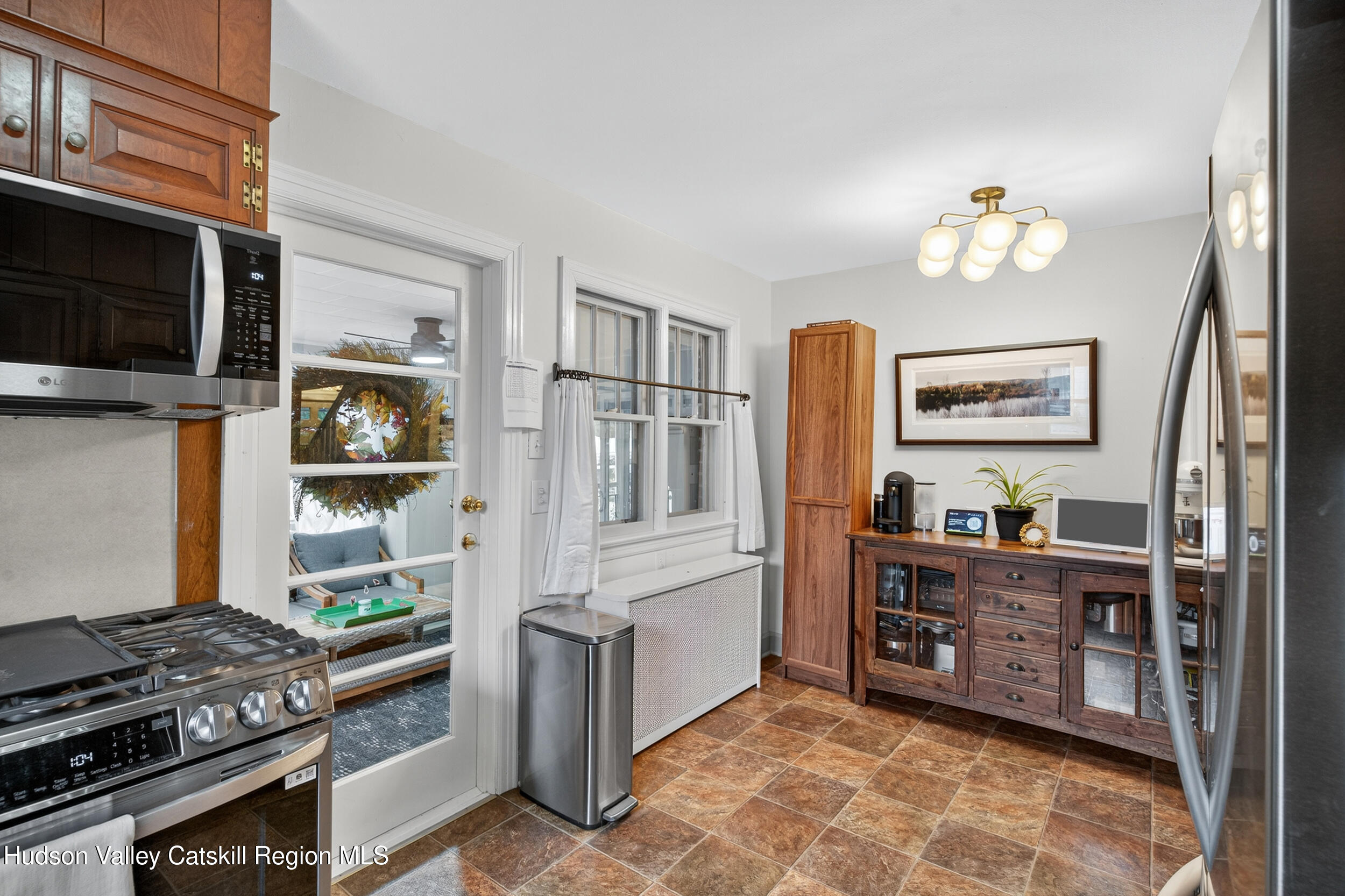 41 New Paltz Road Highland, NY 12528 - Photo 13 of 42 a kitchen with stainless steel appliances granite countertop a stove and a refrigerator