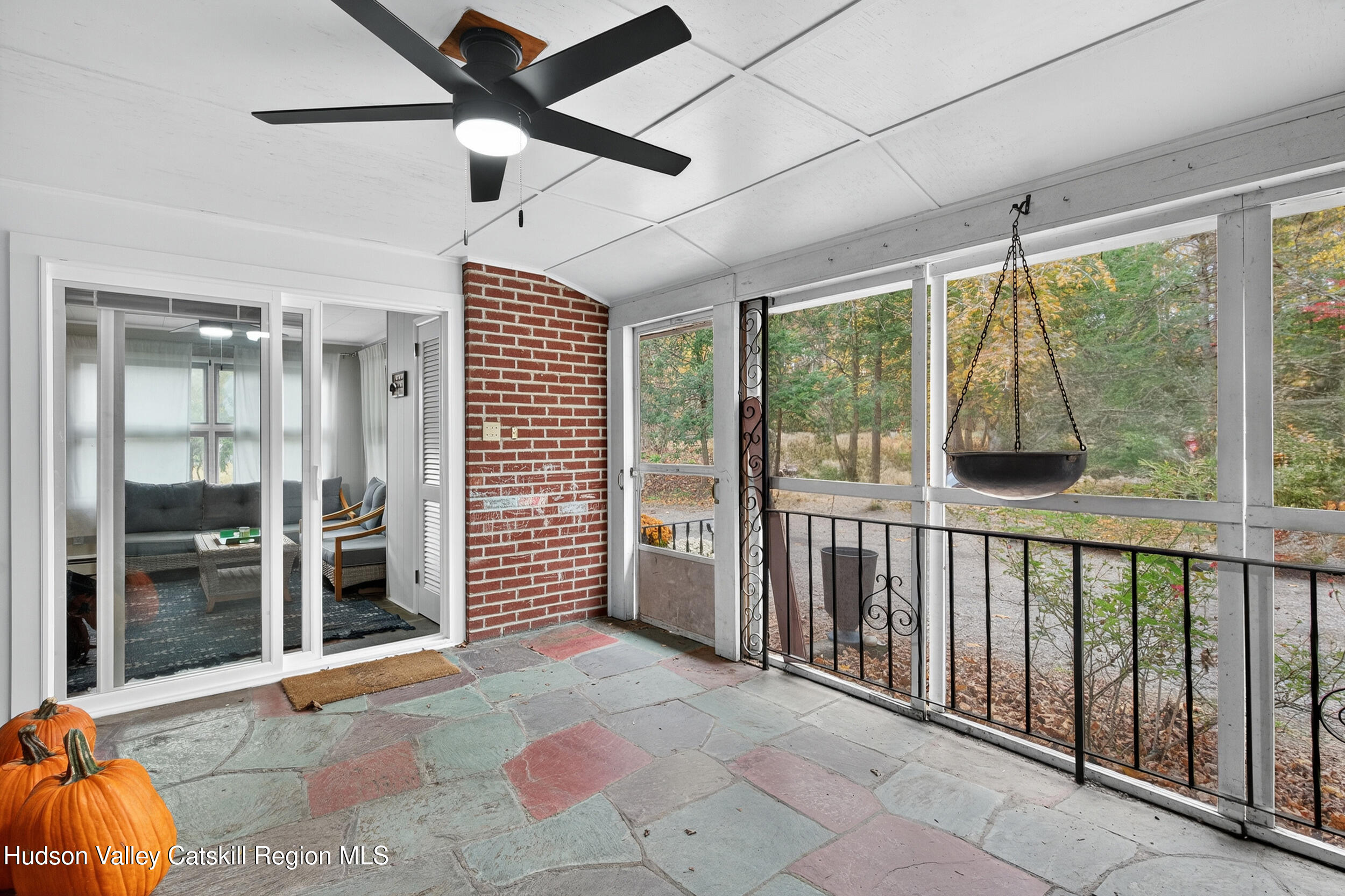 41 New Paltz Road Highland, NY 12528 - Photo 18 of 42 a view of a balcony with furniture and floor to ceiling window