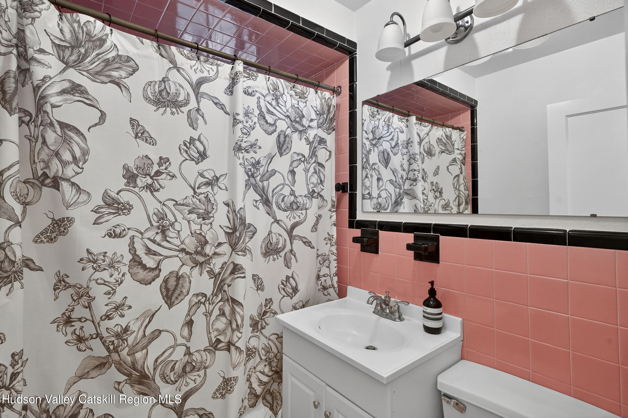 41 New Paltz Road Highland, NY 12528 - Photo 19 of 42 a bathroom with a sink toilet and mirror