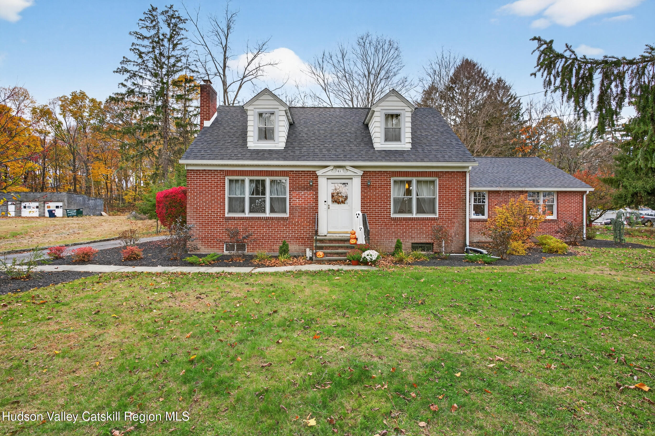 41 New Paltz Road Highland, NY 12528 - Photo 2 of 42 a front view of a house with a garden