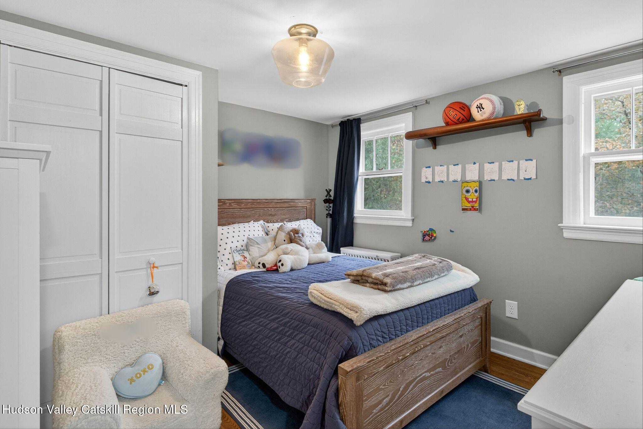 41 New Paltz Road Highland, NY 12528 - Photo 23 of 42 a bedroom with a bed and a window