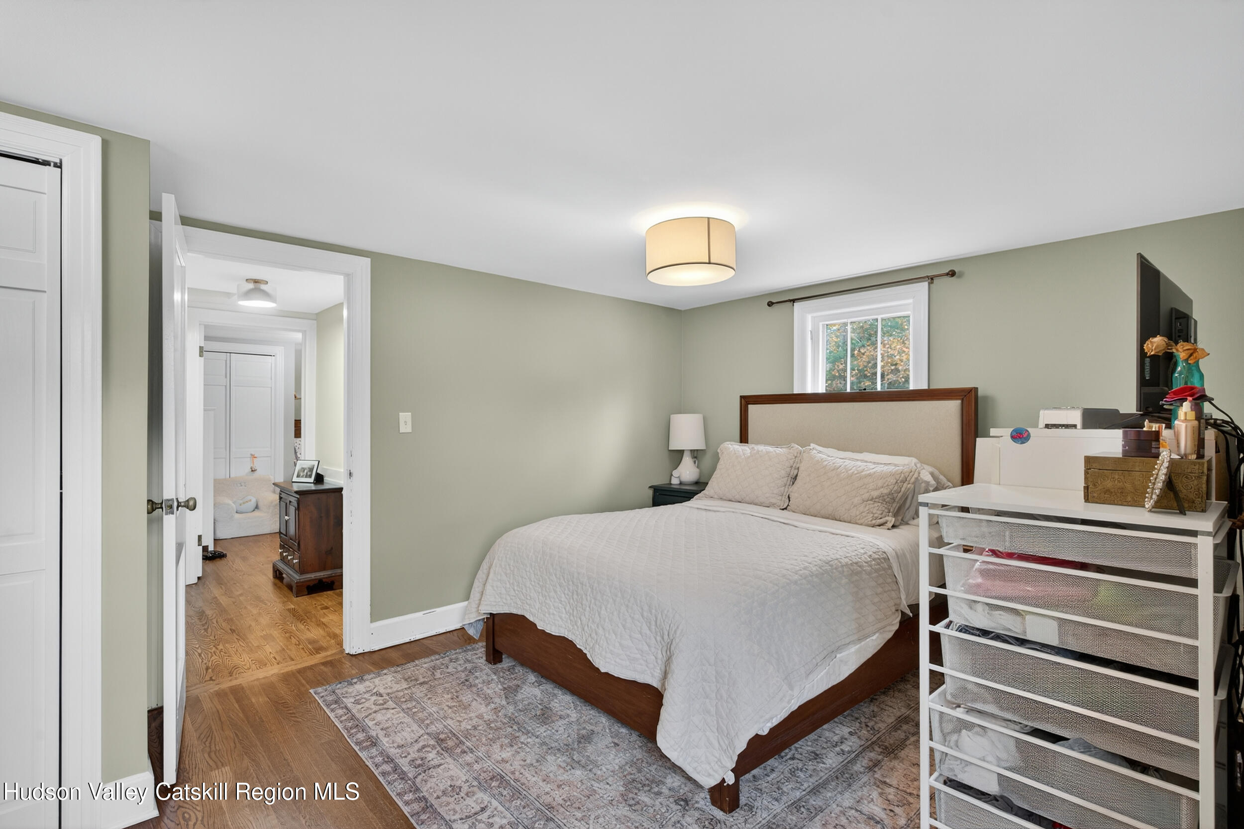 41 New Paltz Road Highland, NY 12528 - Photo 27 of 42 a bedroom with a bed and a view of bathroom