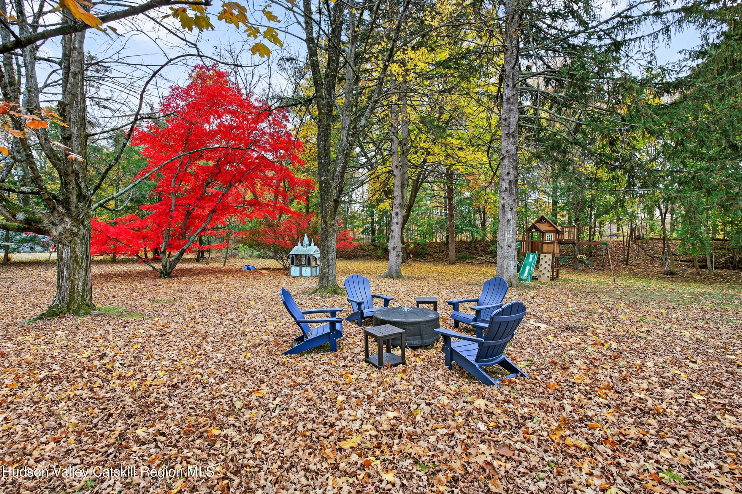 41 New Paltz Road Highland, NY 12528 - Photo 31 of 42 a backyard of a house with outdoor seating