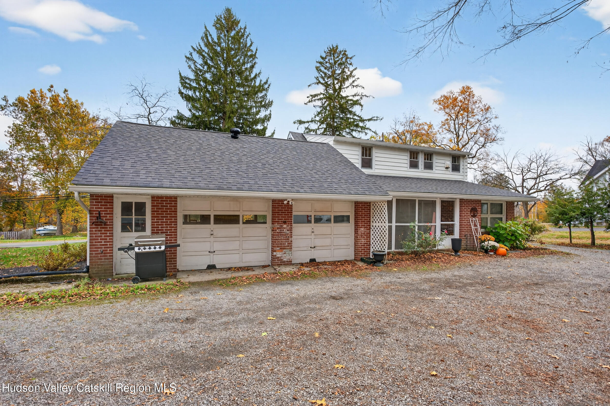 41 New Paltz Road Highland, NY 12528 - Photo 36 of 42 a front view of a house with a garden