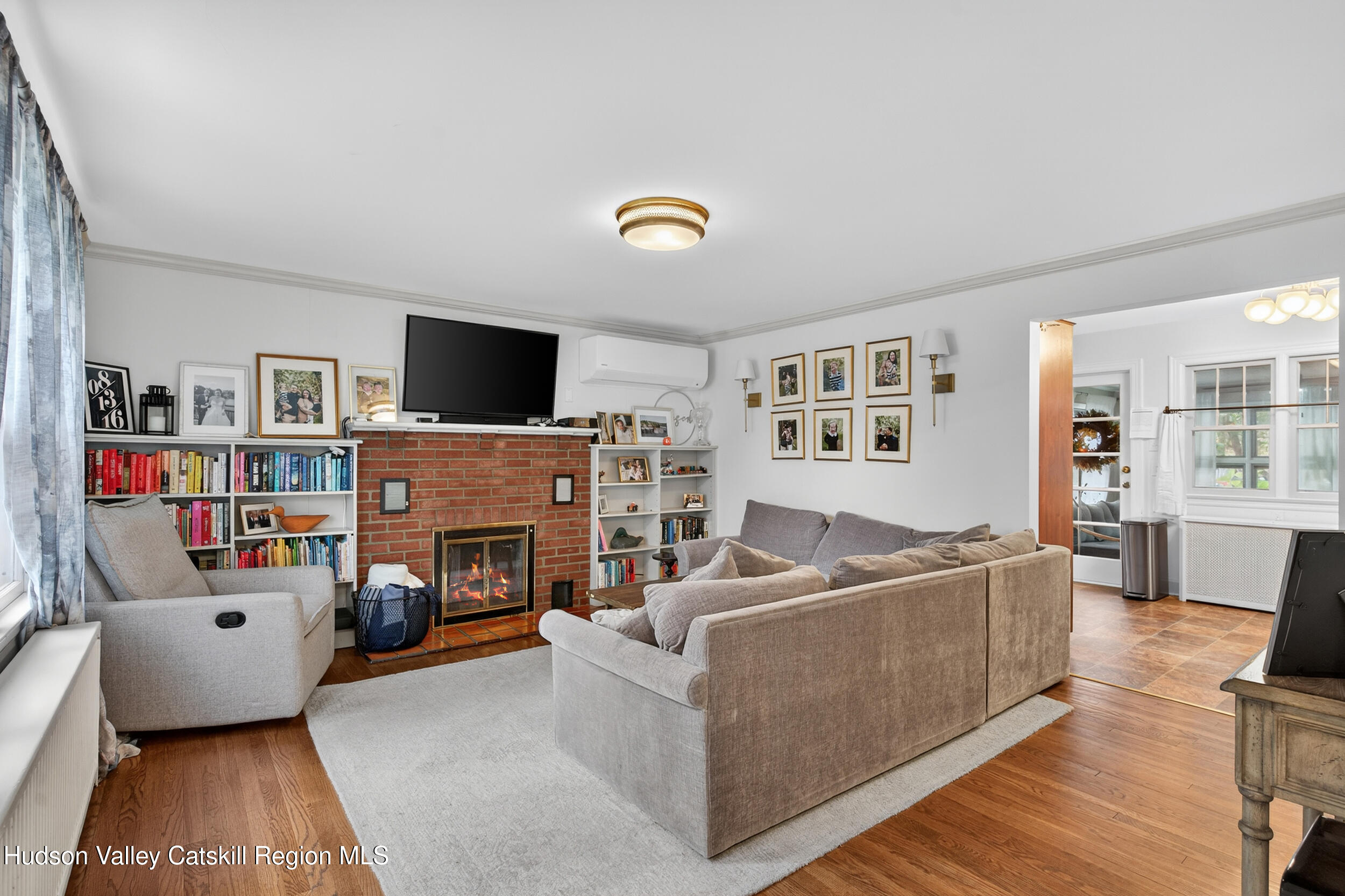 41 New Paltz Road Highland, NY 12528 - Photo 5 of 42 a living room with furniture and a fireplace